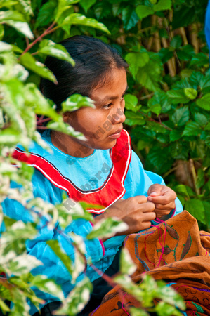 Shipibo woman sewing